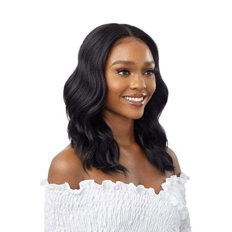OUTRE 18 inch lace front wig synthetic black wavy middle part on model with natural hairline and shoulder length